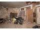 Interior of a damaged room with debris and exposed walls, requiring significant repair and restoration at 1366 Sylvan Sw Rd, Atlanta, GA 30310