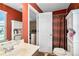 Bathroom featuring a single vanity, toilet and shower with curtain at 3798 Broadleaf Walk, Snellville, GA 30039