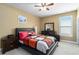 Cozy bedroom with modern furnishings and a comfortable bed at 3798 Broadleaf Walk, Snellville, GA 30039