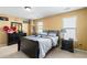 Bedroom featuring carpet, full size bed and two windows at 3798 Broadleaf Walk, Snellville, GA 30039