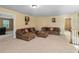 Spacious bonus room provides ample seating and a comfortable living space at 3798 Broadleaf Walk, Snellville, GA 30039