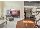 Bright foyer featuring hardwood floors, a staircase, and an open view to the dining room at 3798 Broadleaf Walk, Snellville, GA 30039