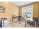 Well-lit home office with a large window and ample workspace at 3798 Broadleaf Walk, Snellville, GA 30039