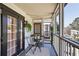 Outdoor balcony featuring seating, plants, and string lights for a cozy atmosphere at 1445 Monroe Ne Dr # C6, Atlanta, GA 30324