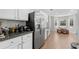 Open kitchen layout featuring stainless steel appliances and a breakfast nook at 3452 Hard Creek Ln, Buford, GA 30519