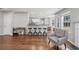 Inviting living room showcasing hardwood floors and a view into the open-concept kitchen at 3452 Hard Creek Ln, Buford, GA 30519