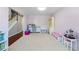 Inviting playroom with soft pink walls, plush carpeting, and ample space for creative play at 3452 Hard Creek Ln, Buford, GA 30519