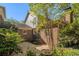 Charming brick home with a manicured backyard, landscaping, and privacy at 629 Pinetree Dr, Decatur, GA 30030