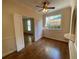 Bright bedroom with hardwood floors, large windows, and double doors leading to another room at 629 Pinetree Dr, Decatur, GA 30030
