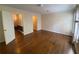 Bedroom with beautiful wood floors and a doorway to the hall at 629 Pinetree Dr, Decatur, GA 30030