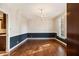 Classic dining room with hardwood floors and elegant chandelier at 629 Pinetree Dr, Decatur, GA 30030