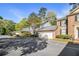 Charming two-story home with attached garage and manicured lawn at 629 Pinetree Dr, Decatur, GA 30030