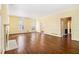 Bright living room features hardwood floors, large windows, and a fireplace at 629 Pinetree Dr, Decatur, GA 30030
