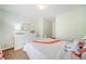 Bright ' bedroom with rainbow accents and a white dresser at 114 Oakview Psge, Canton, GA 30114