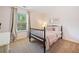 Serene bedroom featuring a spindle bed frame and soft pink accents at 114 Oakview Psge, Canton, GA 30114