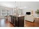 Stylish kitchen island overlooking the living room, perfect for entertaining guests at 114 Oakview Psge, Canton, GA 30114