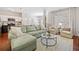 Bright living space showcasing the kitchen, dining area, and cozy living room at 114 Oakview Psge, Canton, GA 30114
