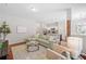 Open-concept living space connects the kitchen, dining, and living areas seamlessly at 114 Oakview Psge, Canton, GA 30114
