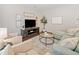 Inviting living room with comfortable seating and a modern entertainment center at 114 Oakview Psge, Canton, GA 30114