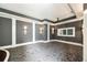 Finished basement featuring crown molding, unique carpet, and custom lighting at 3511 Roxboro Ne Rd, Atlanta, GA 30326