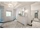 A bright primary bathroom with double vanity, marble floors, and glass enclosed shower at 3511 Roxboro Ne Rd, Atlanta, GA 30326