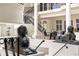Grand entrance foyer featuring custom wrought iron staircase, soaring ceilings, and custom statues at 3511 Roxboro Ne Rd, Atlanta, GA 30326