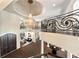 Elegant foyer featuring high ceilings, a grand staircase, and an open view to the living room at 3511 Roxboro Ne Rd, Atlanta, GA 30326