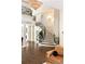 Expansive foyer featuring a grand staircase, chandelier, and open floor plan at 3511 Roxboro Ne Rd, Atlanta, GA 30326