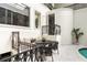 Stylish interior features a seating area, indoor pool, and wrought iron details at 3511 Roxboro Ne Rd, Atlanta, GA 30326