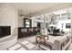 Living room featuring fireplace, bar, elegant tile floors and an open layout at 3511 Roxboro Ne Rd, Atlanta, GA 30326