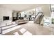 Spacious living room with a bar, fireplace, staircase and an indoor pool at 3511 Roxboro Ne Rd, Atlanta, GA 30326