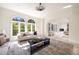 Comfortable living room with large windows and an archway into another space at 3511 Roxboro Ne Rd, Atlanta, GA 30326