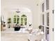 Bright living room with contemporary design, arched windows, modern fireplace, and plenty of natural light at 3511 Roxboro Ne Rd, Atlanta, GA 30326