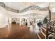 Expansive living space features hardwood flooring, decorative wrought iron, and modern décor at 3511 Roxboro Ne Rd, Atlanta, GA 30326