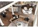 Living room featuring a large sectional sofa, a modern chandelier, and an open concept design to the kitchen at 3511 Roxboro Ne Rd, Atlanta, GA 30326