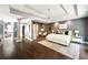 Spacious main bedroom features hardwood floors, tray ceiling, and neutral decor at 3511 Roxboro Ne Rd, Atlanta, GA 30326