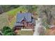 Overhead angle of the home with a large, well maintained front yard at 220 Carriage Station Dr, Lawrenceville, GA 30046