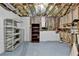 Unfinished basement showcasing exposed insulation, utilities, and ample storage space at 220 Carriage Station Dr, Lawrenceville, GA 30046