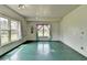Spacious bedroom featuring a large window, unique curtains, and ample natural light at 220 Carriage Station Dr, Lawrenceville, GA 30046