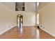 Large open living room featuring wood floors and many windows at 220 Carriage Station Dr, Lawrenceville, GA 30046