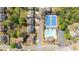 Aerial view showcasing the property's location near community amenities like a pool and tennis courts at 4215 Evans Farms Dr, Cumming, GA 30040