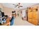 Cozy office features a desk, seating, and a vintage wood entertainment center at 4215 Evans Farms Dr, Cumming, GA 30040