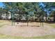 Community swings near a wooded area offer a fun outdoor activity at 4215 Evans Farms Dr, Cumming, GA 30040