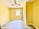 Bedroom with modern vinyl flooring, ceiling fan, and a bright window at 4554 Saint Andrews Dr, Atlanta, GA 30331