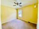Bright bedroom features a ceiling fan and a window providing natural light at 4554 Saint Andrews Dr, Atlanta, GA 30331