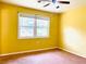 Bedroom with ceiling fan and a window providing natural light at 4554 Saint Andrews Dr, Atlanta, GA 30331