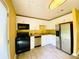 Modern kitchen featuring stainless steel appliances, white cabinetry, and granite countertops at 4554 Saint Andrews Dr, Atlanta, GA 30331