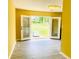 Sunlit bonus room or flex space with french doors leading to the backyard and doghouse at 4554 Saint Andrews Dr, Atlanta, GA 30331