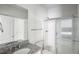 Bathroom featuring granite vanity, stainless steel faucet, and a walk-in shower at 795 Clark Lake Estates Dr, Grayson, GA 30017