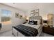 Bedroom featuring a cozy bed with stylish linens and decorative wall art at 1012 Merritt Dr, Villa Rica, GA 30180